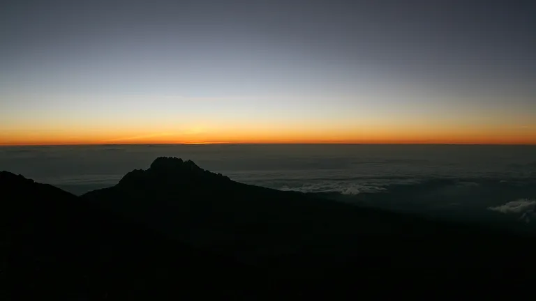 First light at Gilman's Point on the crater rim of Kilimanjaro