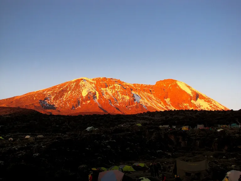 Kibo glowing orange at sunset, Mount Kilimanjaro